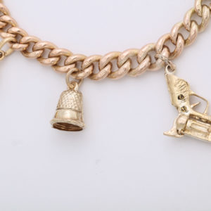 English 18k and 9k Gold Charm Bracelet, Birmingham, 1950s